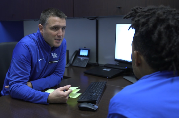 UK Academic Counselor Jon Ross talks with Stephen Johnson, UK Football Player