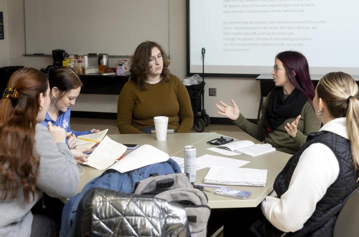 photo of student group participating in the creative workshop five UK students participating in the creative workshop while sitting at a round table in a classroom