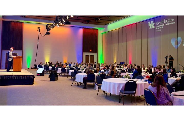 Gill Affiliate Network Conference attendees listen to a presenter in a large ballroom.