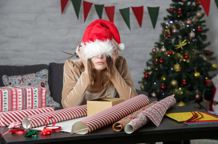 Getty Image of Woman Wrapping Presents