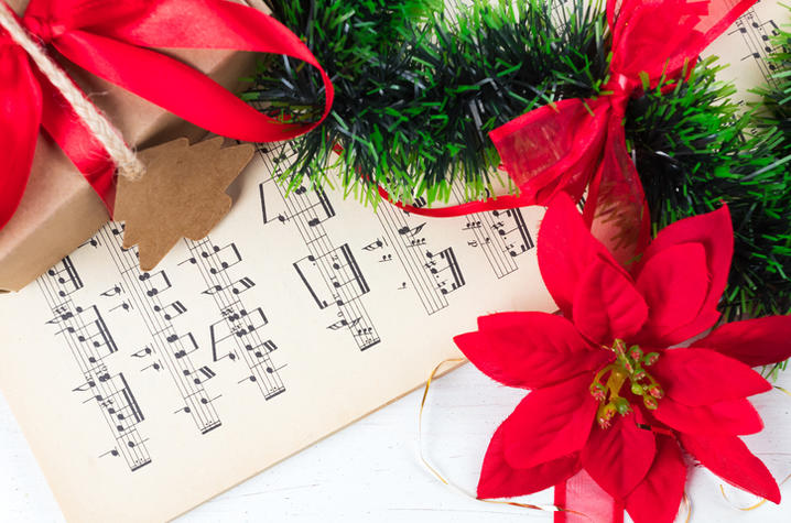 sheet music and poinsettias