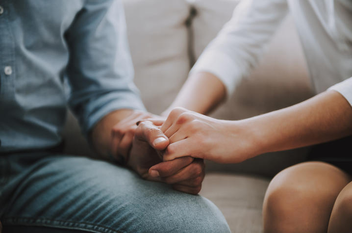 Getty Image of People Holding Hands