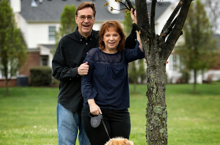 Photo of Gregg and Kim Whiteker at their "Praying Tree." Mark Cornelison | UK Photo