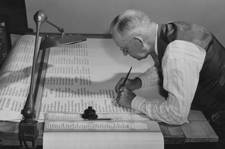 Remembering Kentucky's Fallen Heroes, Photo from UK Special Collections This is a photo of Professor Horine inscribing the names of Kentucky's fallen World War Two heroes.