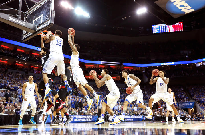 Photo by Michael Huang: Time lapse of Willy Cauley Stein dunking on Cincinnati player during 39-1 season. 