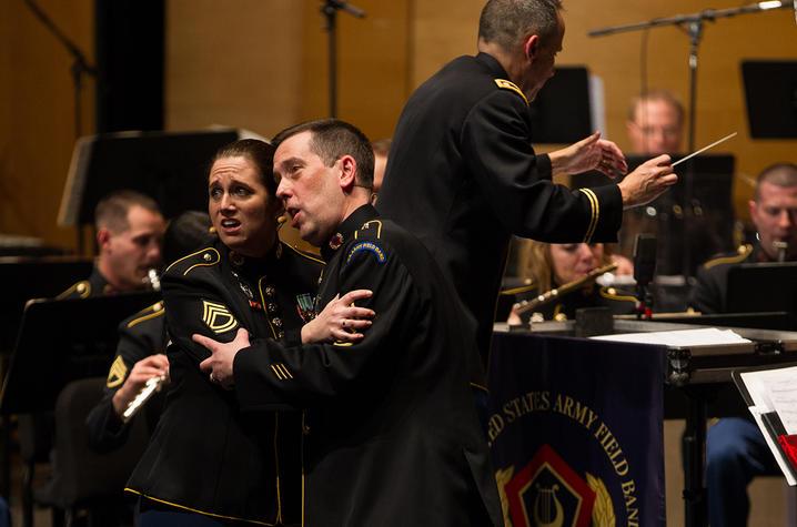 photo of Charis Strange and Mark Huseth performing duet in front of US Army Field Band - Concert Band