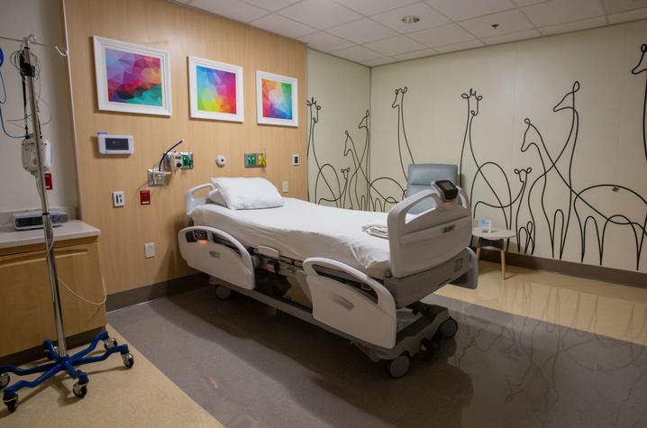 image of bed in child-friendly sleep study exam room