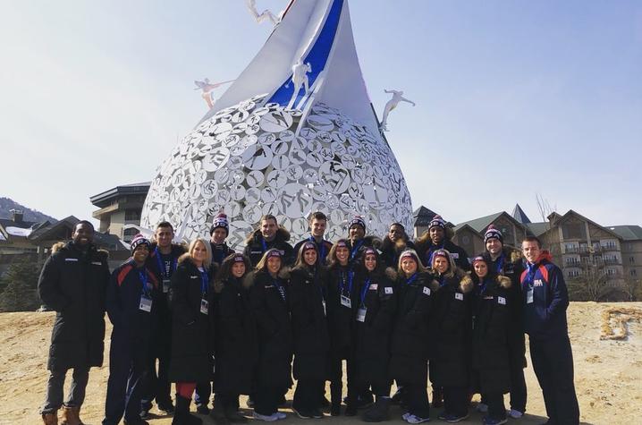 This is a photo of the UK Cheerleaders, representing USA Cheer & Team USA, at the 2018 Winter Olympics.