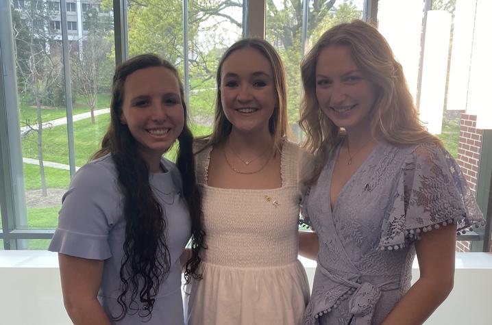 Ainsley Flask, director of programming (left), Savannah Miller, president (middle), and Kelli Burnett, vice president (right) pictured at initiation on April 18, 2021.  