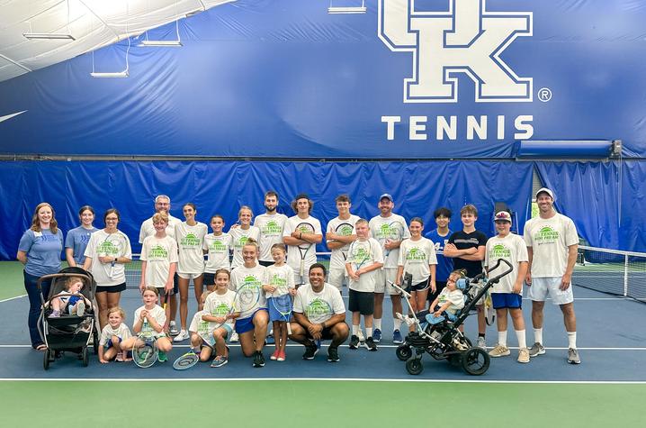 group photo of KCH patients and tennis players