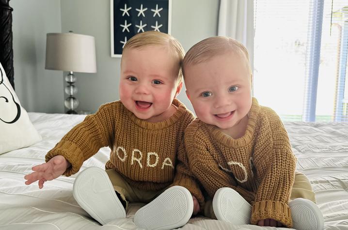 Photos of twins on bed