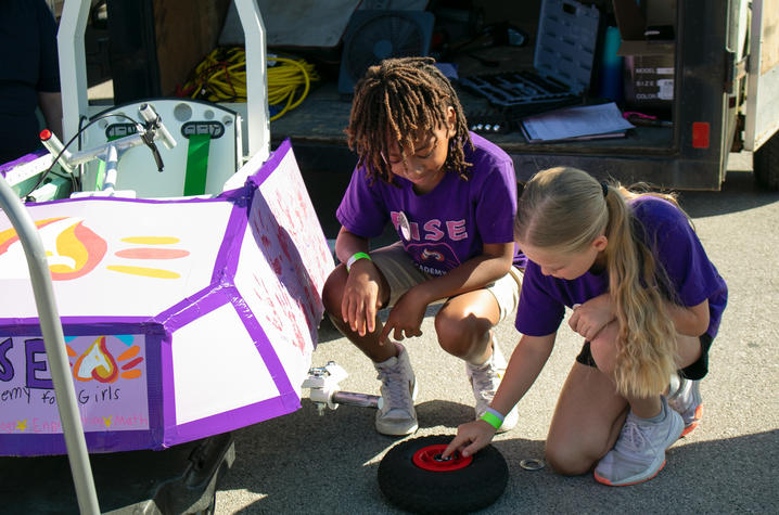Students on the Rise STEM Academy team prepare for the GEN-EV race at Kroger field June 4. Kirsten Delamarter | Kentucky Energy and Environment Cabinet