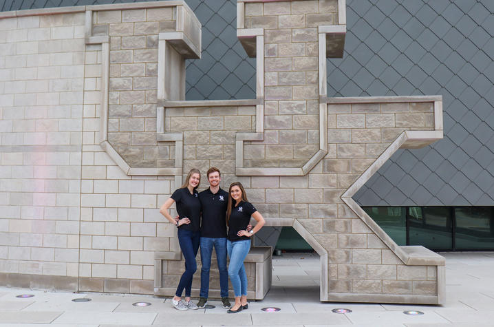 photo of students standing in front on UK student center