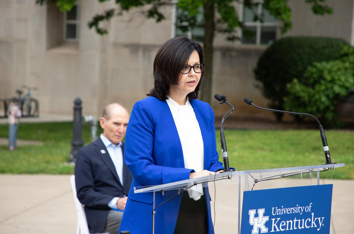 Woman standing at podium