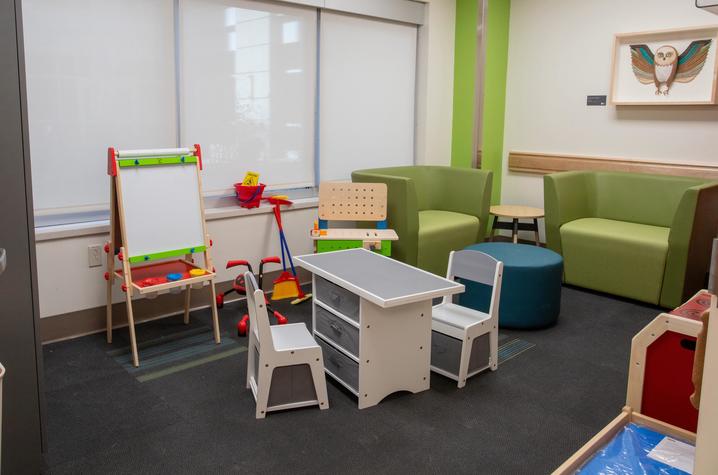 image of therapy room with colorful toys and child-sized furniture