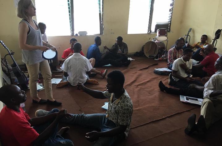 photo of Martina Vasil leading music education workshop in Liberia