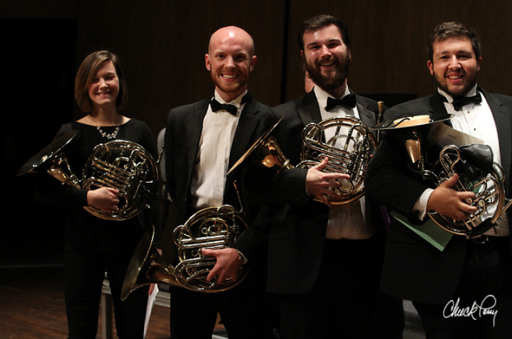 photo of Nathan Williams (2nd from left) and fellow French horn players