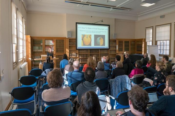 photo of Kyra Seevers explaining photogrammetry