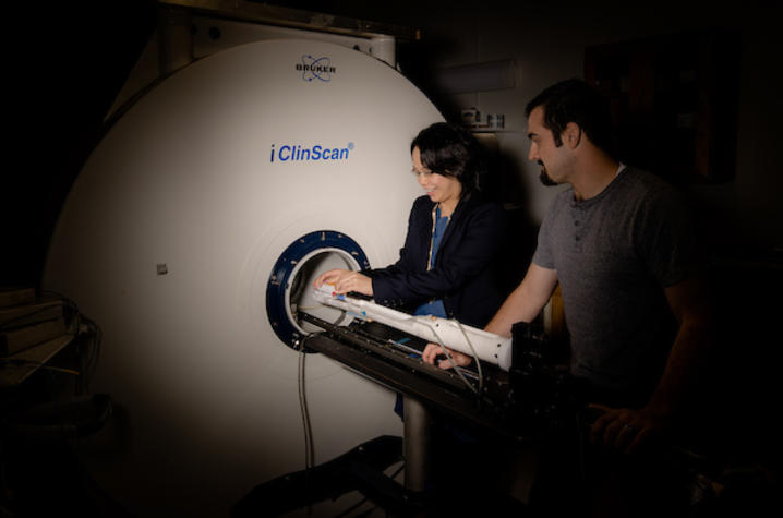 Photo of Dr. Ai-Ling Lin, UK Sanders-Brown Center on Aging, and Scott Thalman, a MD/PhD student in Biomedical Engineering. 