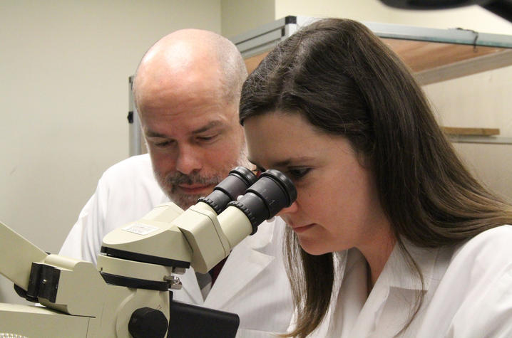 Photo of Jenna Gollihue and Chris Norris at the Sanders-Brown Center on Aging