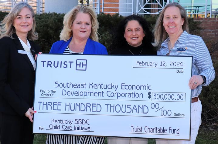 Group presented with check