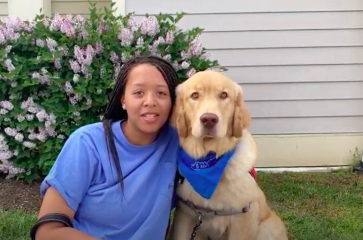 photo of Camryn Lee and service dog-in-training Talbott