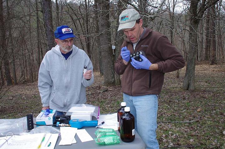 Richard Smath and Steve Webb of KGS collect and label groundwater samples for the northeastern Kentucky well-sampling project.