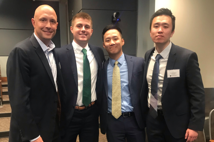 photo of Quint Tatro, Will Smith, Michael Zhu and Frank Zhang at Stock Pitch competition