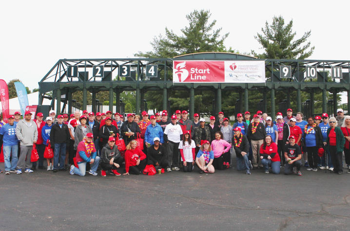 image of group of walkers and runners at the start gate at Keeneland.