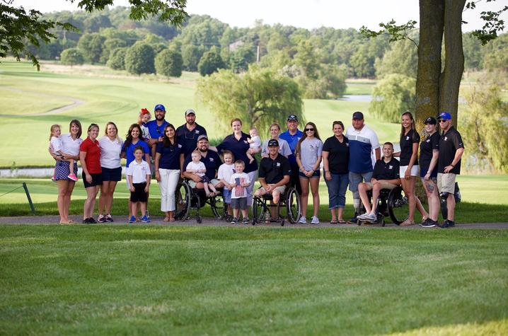 This is a photo of the "Swings for Soldiers" family.