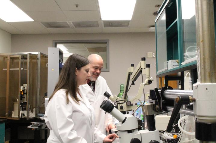 Photo of Jenna Gollihue and Chris Norris at the Sanders-Brown Center on Aging