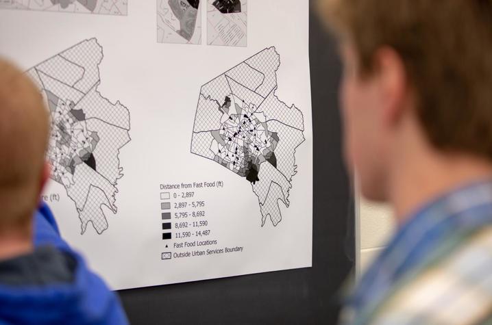 Student looking at a map