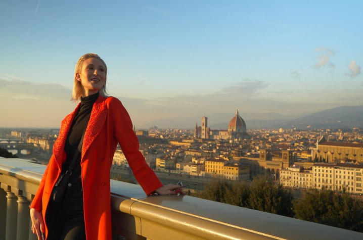 photo of Carlotta in "Va Bene Cosi" with Florence in the background