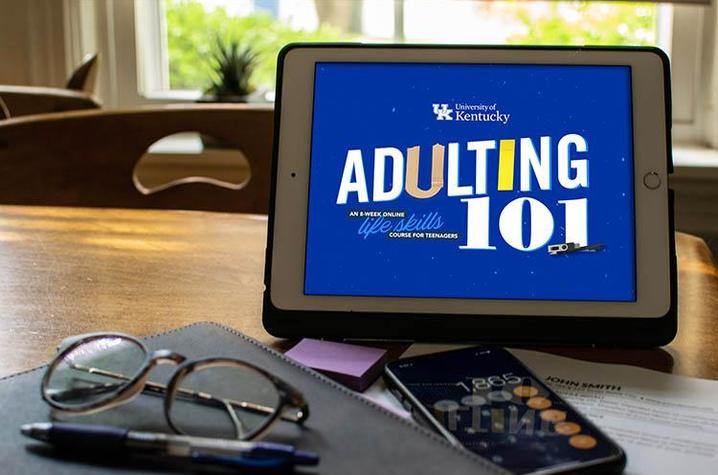 Tablet with Adulting 101 logo on screen 