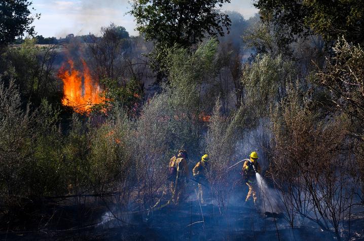 This photo, by Arden Barnes, won 2nd Place Spot News.