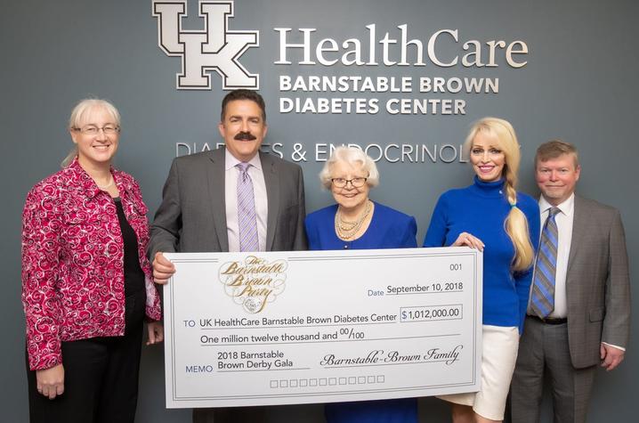 2018 check presentation to UK HealthCare's Barnstable Brown Diabetes Center. Left to Right – Dr. Lisa Tannock, Dr. Mark F. Newman, Willie Barnstable, Tricia Barnstable-Brown, Dr. John Fowlkes