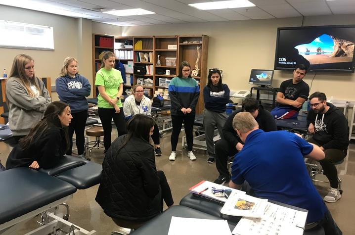 Photo of UK physical therapy students with Professor Pat Kitzman