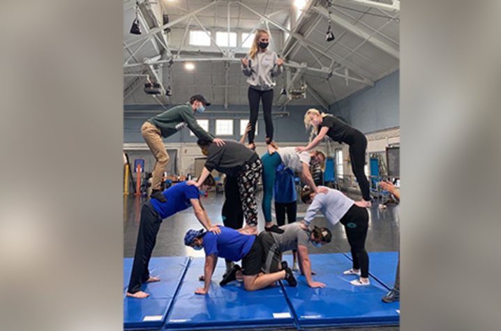 photo of UK students acro-balancing with UK Circus Club