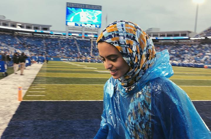 photo of Hadeel Abdallah at Kroger Field after game recognition