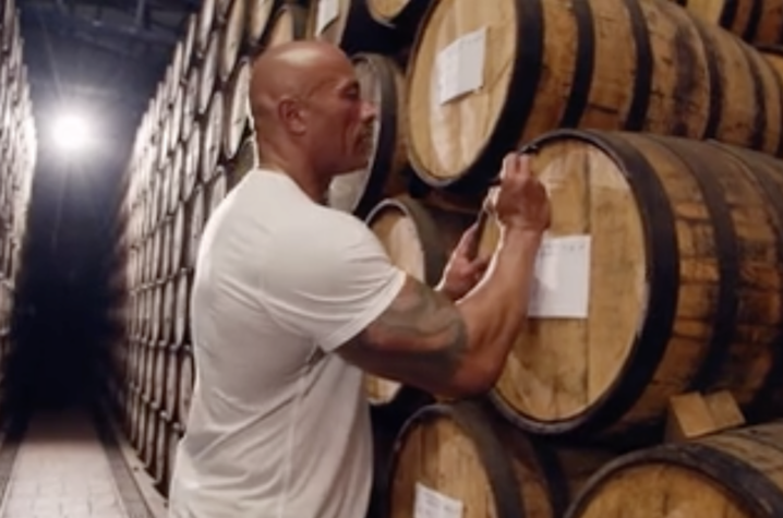 Photo of Dwayne Johnson Signing a Barrel