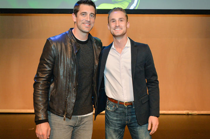This is a photo of Green Bay Packers QB Aaron Rodgers (L) with Ed Berry (R).