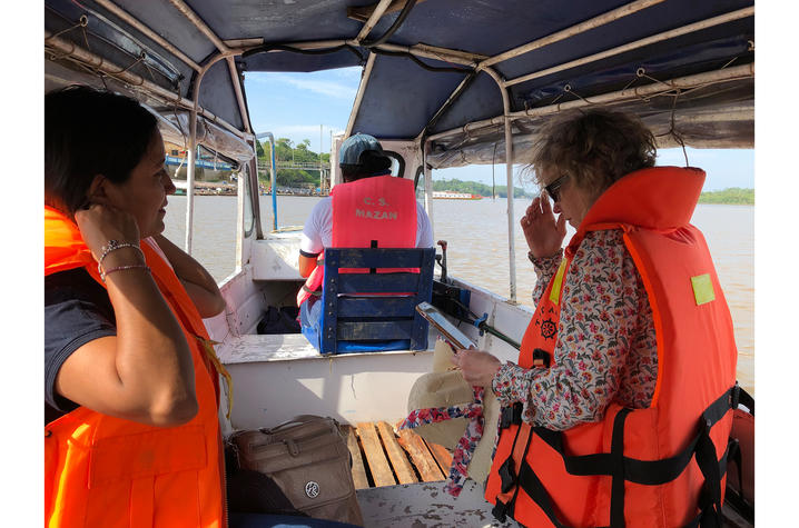 Members of the team traveled by boat from Iquitos, the city where the trial is conducted, to the recruitment sites. The boats run from village to village along the Amazon River. Photo provided by Courtney Hammil. 