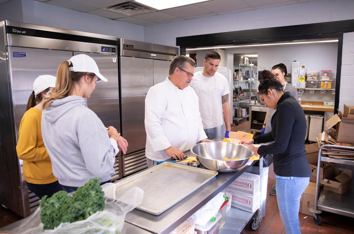 Chef Bob Perry instructs students in Erikson Hall kitchen