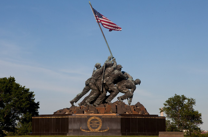 A statue honoring the second Iwo Jima flag raising sits atop granite in Arlington, Virgina | Marine Corps War Memorial This is a photo of a statue honoring the second Iwo Jima flag raising, at the Marine Corps War Memorial in Arlington, Virgina.