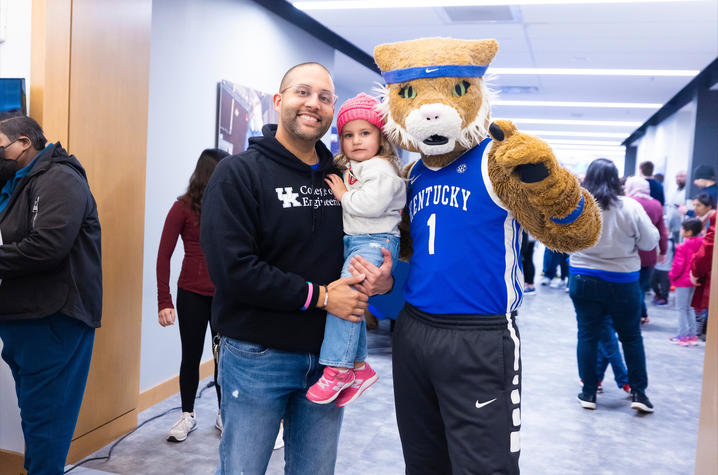 Photo of Gabriel Dadi and daughter at E-Day