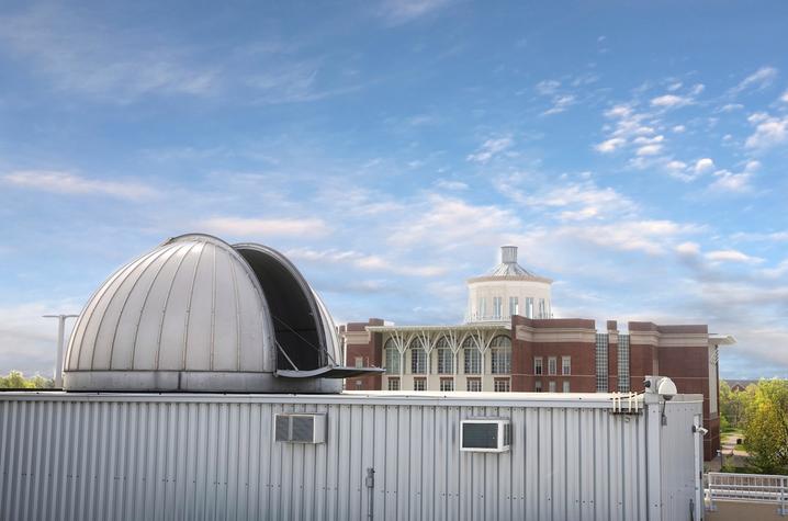 photo of MacAdam Student Observatory with Young Library in background