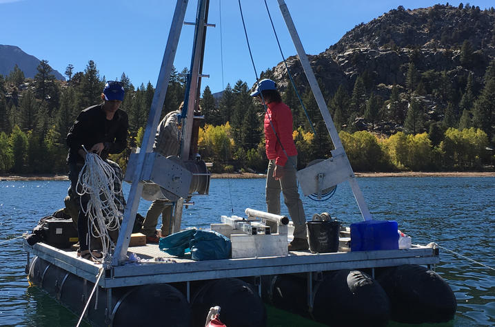 photo of Students collecting sediment cores on June Lake. Photo provided.