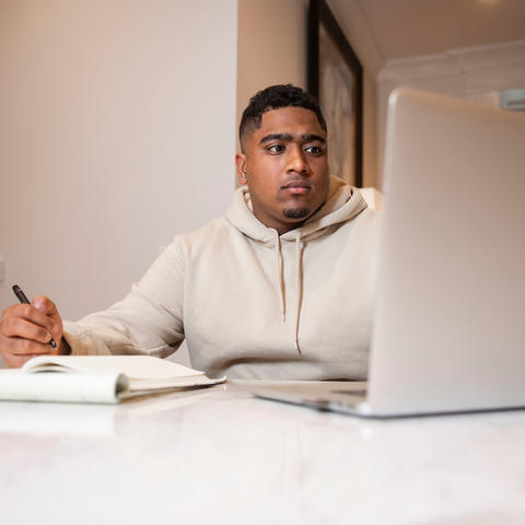 Man working on computer. 