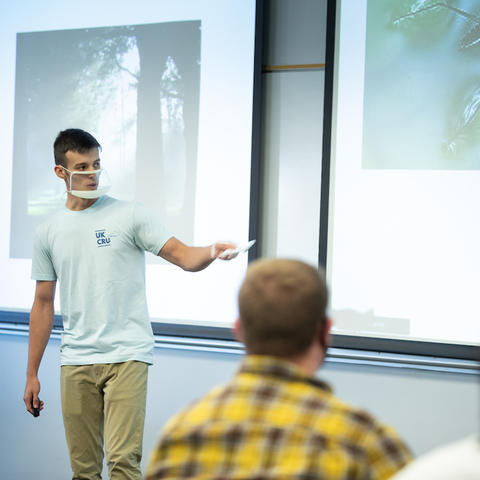 A student presenting in a clear face mask. Photo by Mark Cornelison | UKphoto
