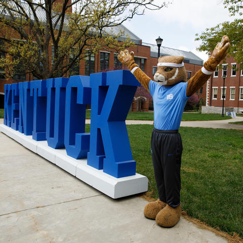The UK Wildcat mascot serves as the "Y" in large letters spelling "Kentucky" near White Hall Classroom Building during "One Day for UK." Mark Cornelison and Pete Comparoni | UK Photo. 